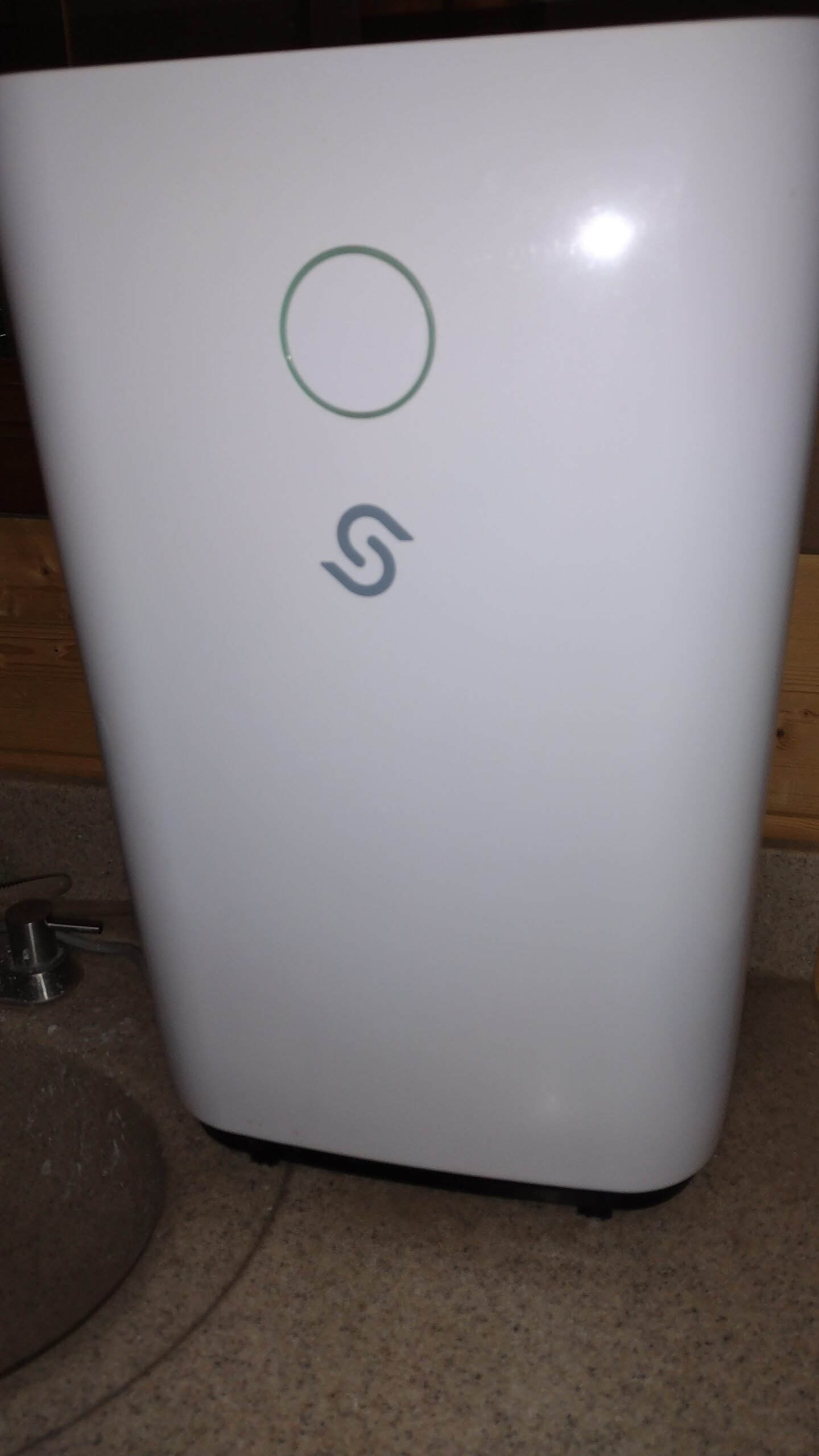 The front of the dehumidifier that is located in the basement bathroom.