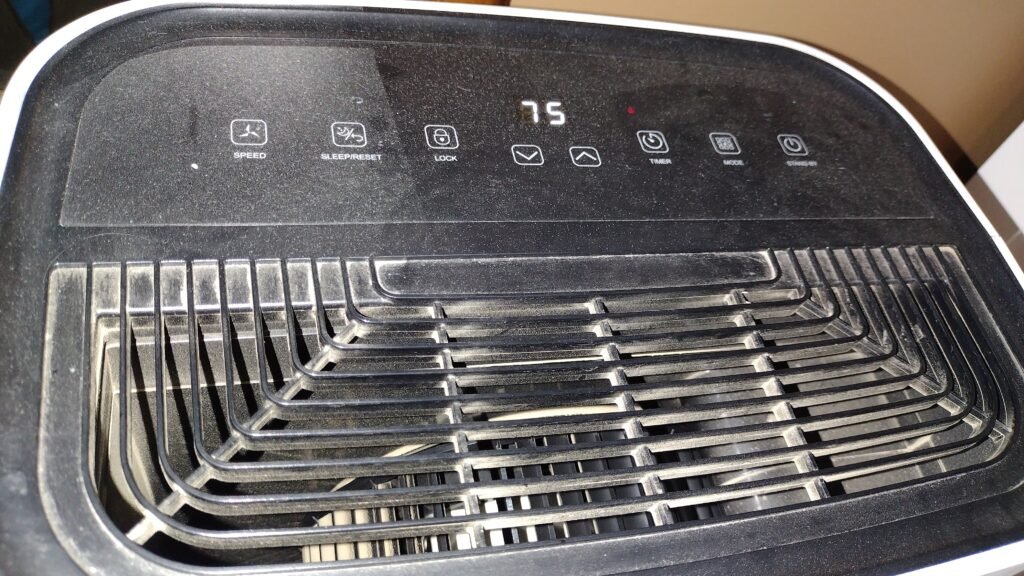 The top of the Dehumidifier that is located in the basement bathroom that has no exhaust fan.