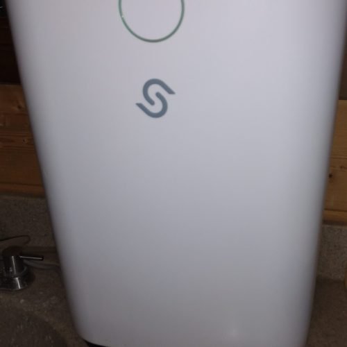 The front of the dehumidifier that is located in the basement bathroom.