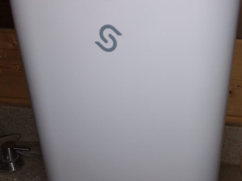The front of the dehumidifier that is located in the basement bathroom.